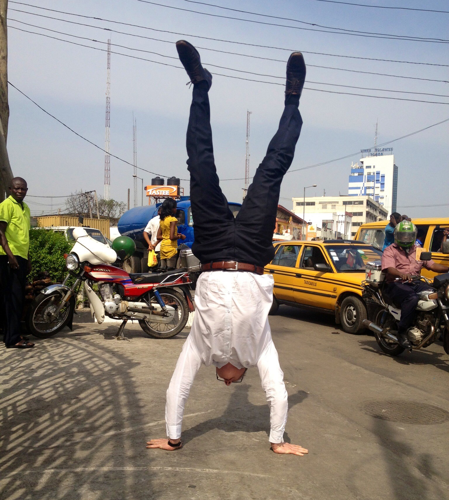 Antoine Bosque doing handstand in Nigeria