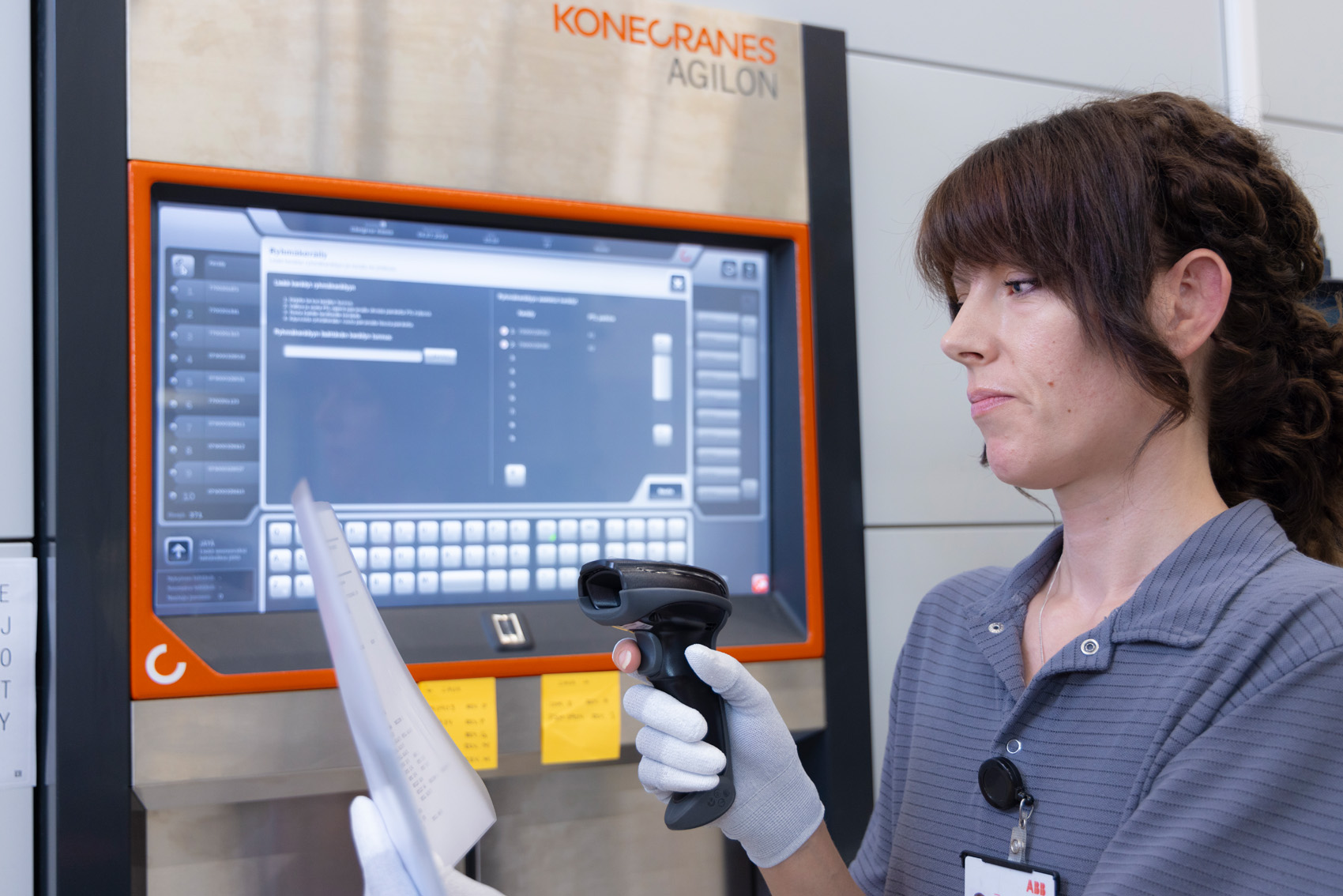 ABB Distribution Solutions worker scanning CTO work order barcode from SAP list to start picking in Agilon warehouse automation system