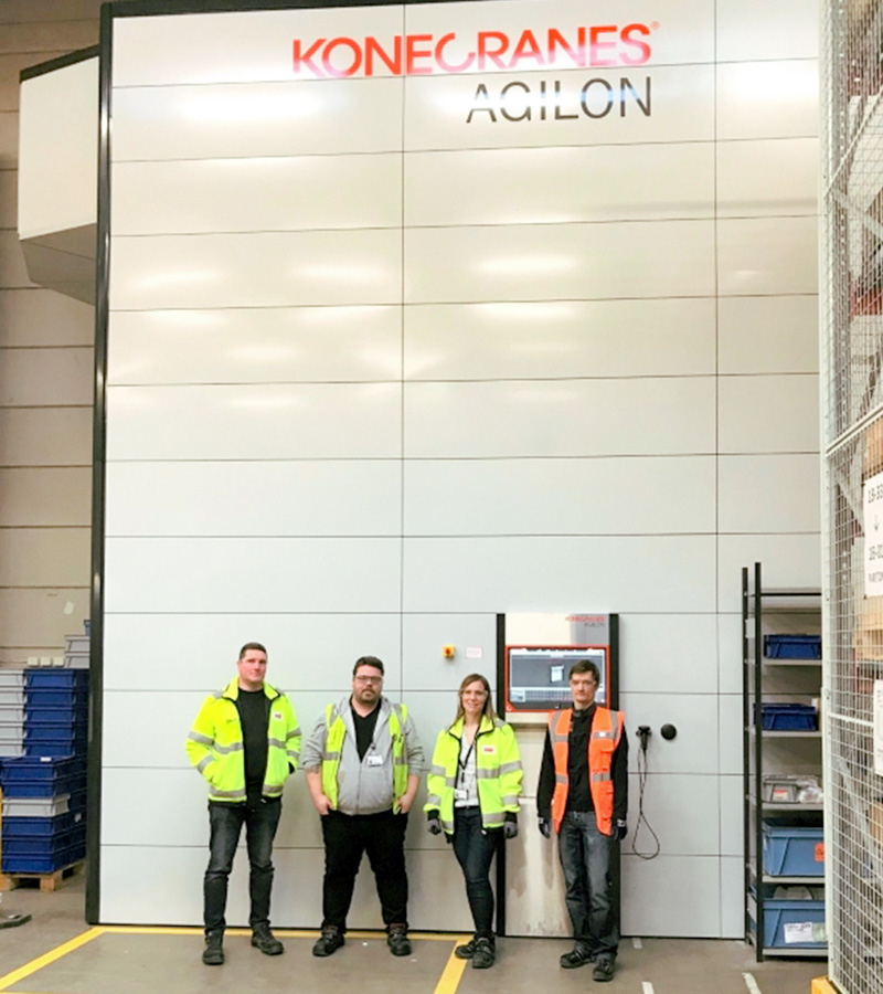 ABB Motos and Generators Service warehouse workers in front of Agilon system