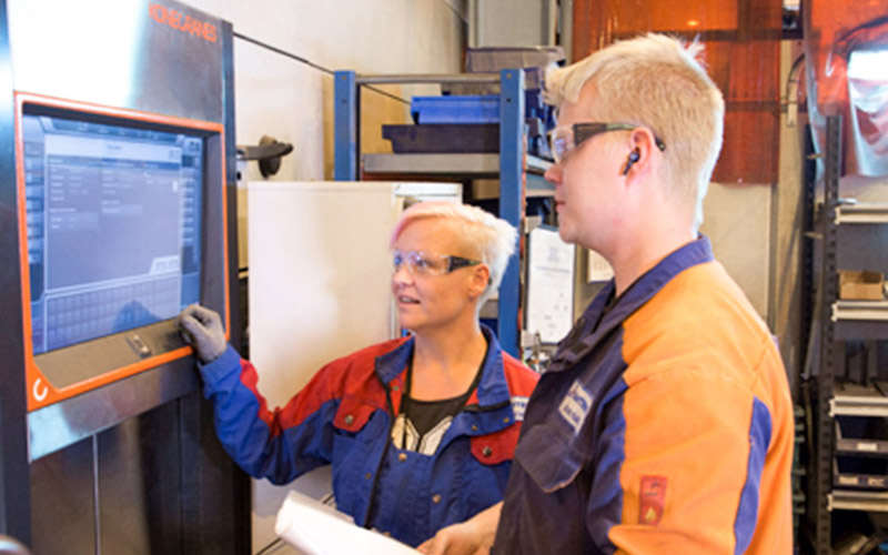Workers using Agilon warehouse automation system