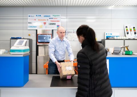 Marko Remsu serves the customer in the Electro Center component shop 