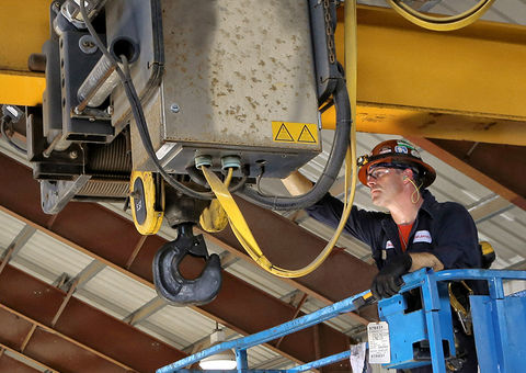 Konecranes technician inspects crane