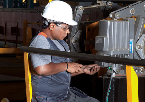 Technician works on crane