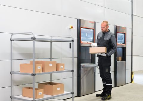 Distribution operations worker utilizes agilon warehouse automation parallel picking