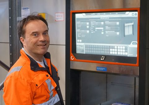 Steel-Kamet Oy’s project manager Teemu Kurikkala smiles in front of the Agilon hatch while storing package