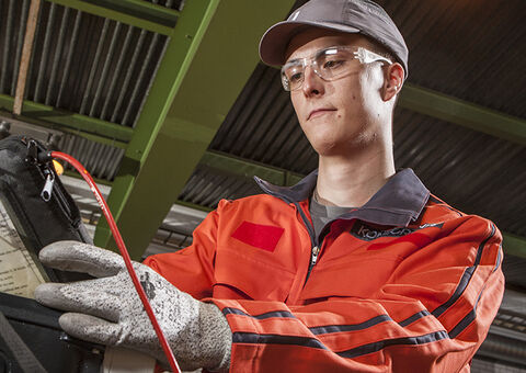 Technician working on crane