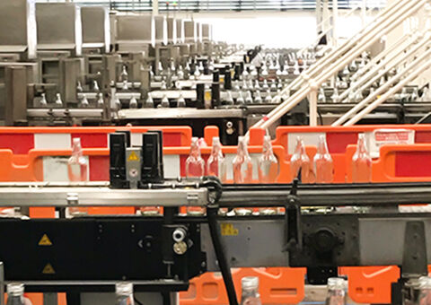 Bottles on conveyor