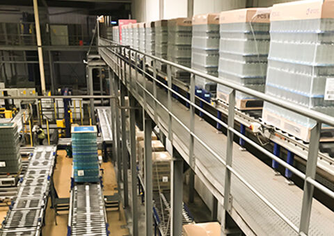 Materials moving down conveyor