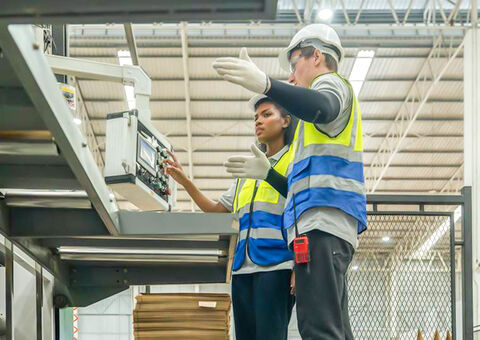 Workers in automated warehouse