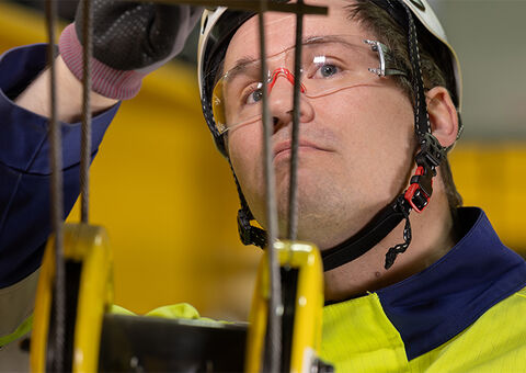 Konecranes technician inspecting crane