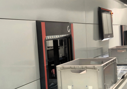 Konecranes Agilon conveyor handling material flow into and out of the system.