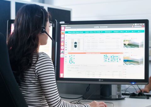 Agilon remote support specialist monitoring an Agilon system