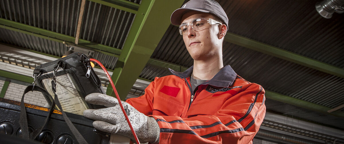 Technician working on crane