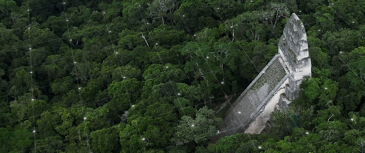 Maya ruins in jungle seen from above
