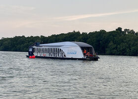 The interceptor removes plastic debris.