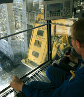 Crane operator using coker crane